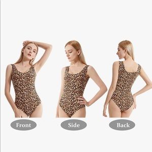 new leopard bodysuit . size L . never worn.